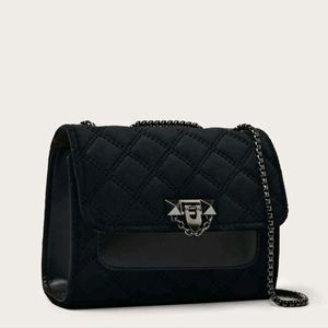 Black quilted velvet purse